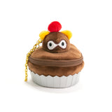 MYUUA × Okinado Tanuki Cake Plush Pouch — main product view featuring Okinado tanuki cake plush