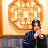 MYUUA China Mooncake-Shaped Pouch — lifestyle styling shot