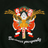 Embroidered design on a black background with traditional elements and 'Business prosperity' text.