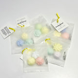 Several packaged mini aroma stone sets showing assorted color combinations