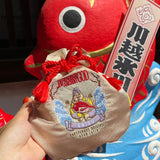 MYUUA Ebisu God of Fortune Drawstring Pouch — lifestyle styling shot