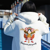 Person wearing a white hoodie with a colorful graphic and 'Business prosperity' text on the back.